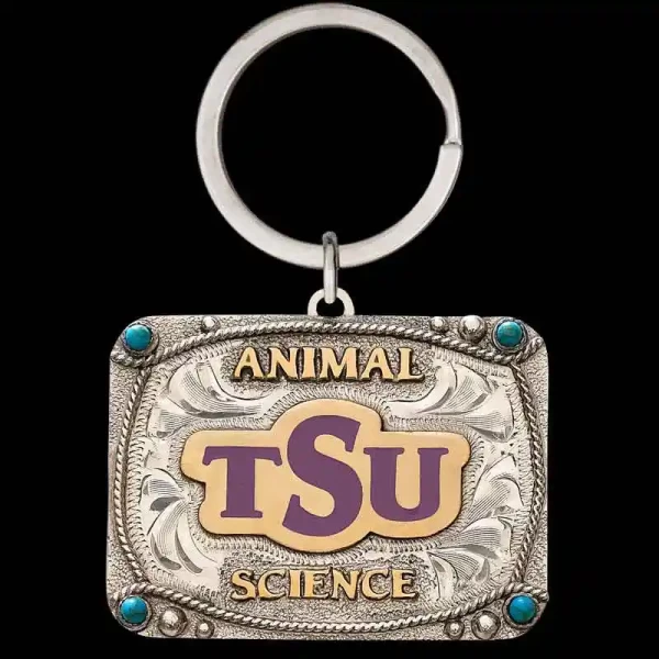 "Our True Grit Custom Keychain is expertly crafted with a hand-engraved German Silver base, featuring a traditional rope edge, Jeweler's Bronze lettering, and small cubic zirconia stones in each corner. Designed to be customizable, this keychain lets